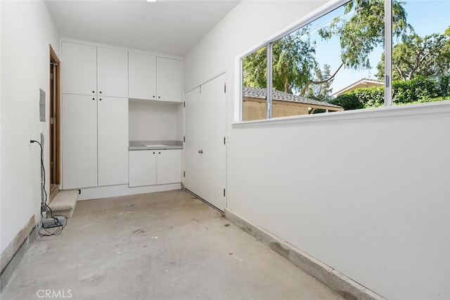 laundry room with a healthy amount of sunlight