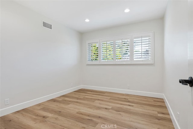 empty room featuring light hardwood / wood-style flooring