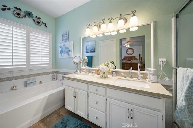 bathroom featuring shower with separate bathtub, vanity, tile patterned floors, and ceiling fan