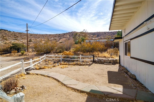 view of yard with a mountain view