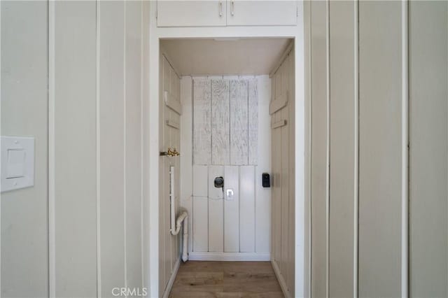 bathroom with wood-type flooring