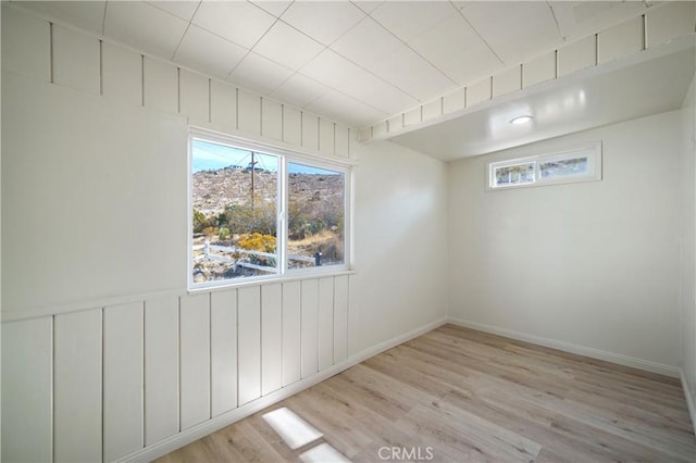 empty room with light wood-type flooring