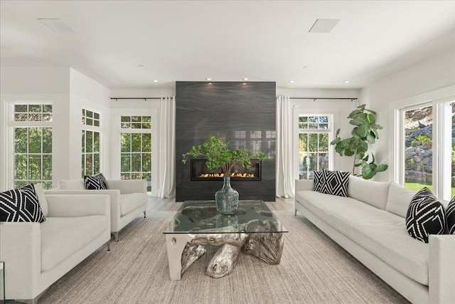 living room with light hardwood / wood-style floors