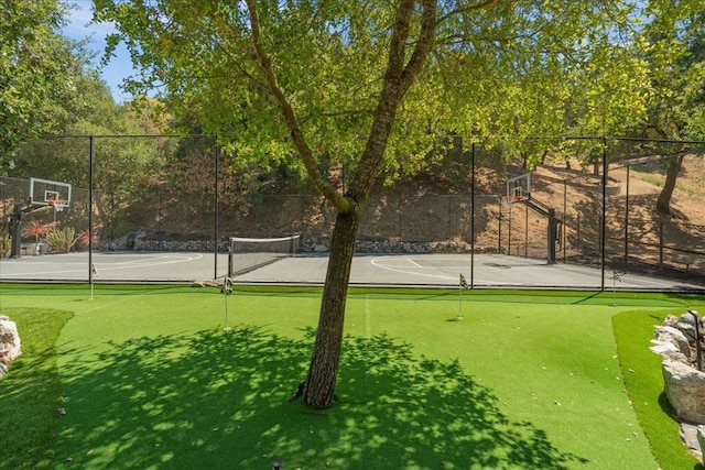 view of basketball court with tennis court