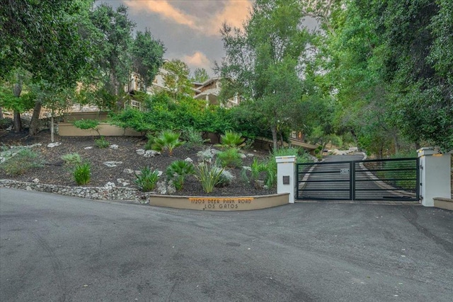 view of gate at dusk