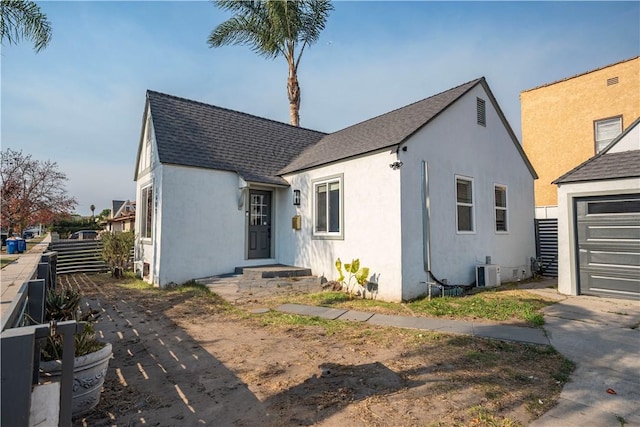 view of front of property with cooling unit