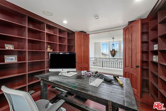 home office with dark hardwood / wood-style floors