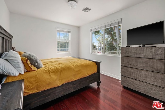 bedroom featuring dark hardwood / wood-style floors