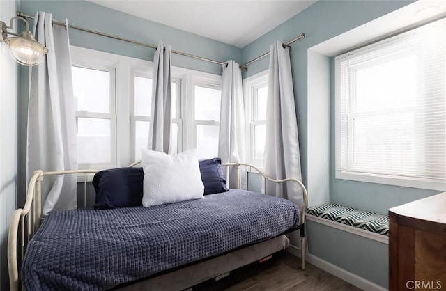 bedroom featuring dark hardwood / wood-style floors