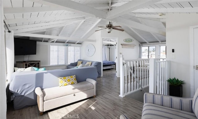 living room featuring hardwood / wood-style floors, vaulted ceiling with beams, ceiling fan, and wood ceiling