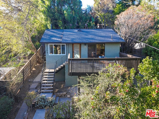 view of front facade featuring a wooden deck