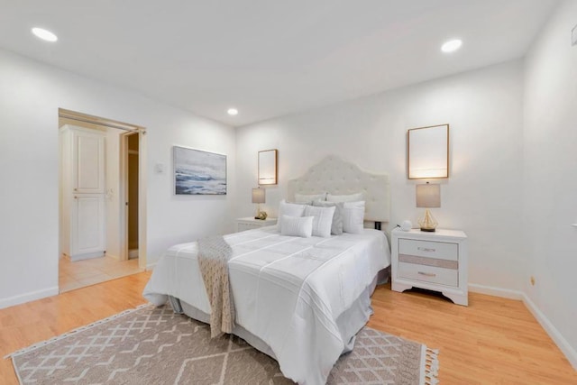 bedroom with light hardwood / wood-style flooring