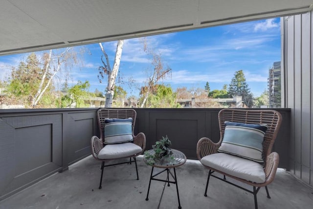 view of patio / terrace with a balcony