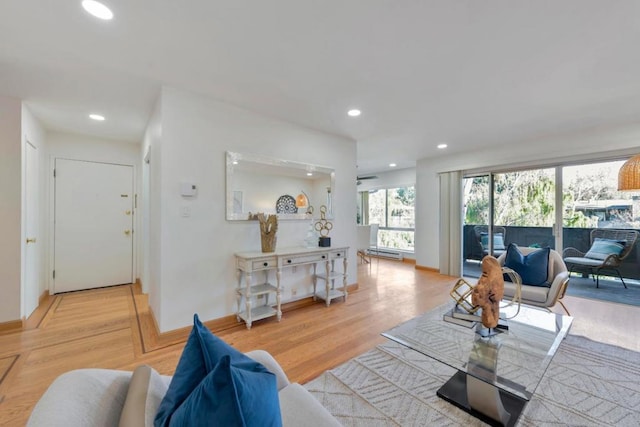 living room with light hardwood / wood-style flooring