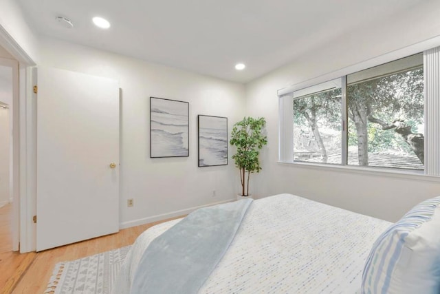 bedroom with light wood-type flooring