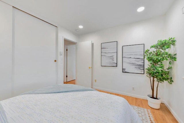 bedroom featuring light hardwood / wood-style flooring