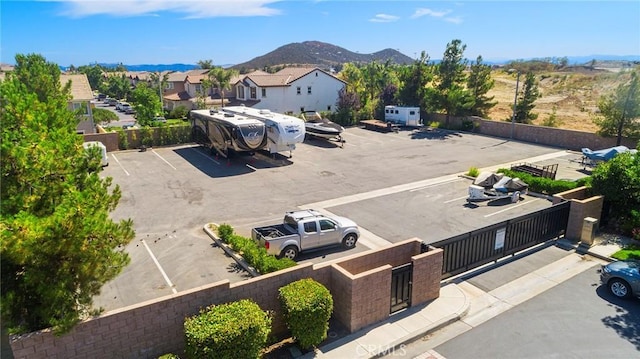 birds eye view of property featuring a mountain view