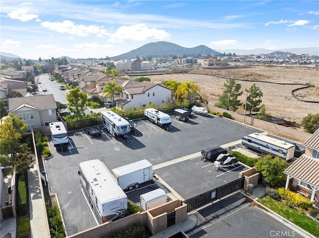 drone / aerial view featuring a mountain view