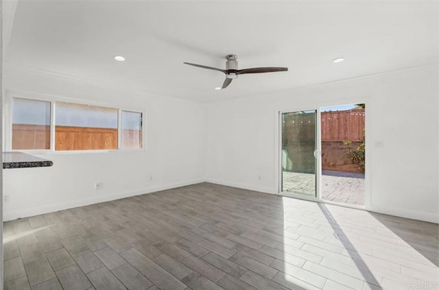 unfurnished room featuring ceiling fan