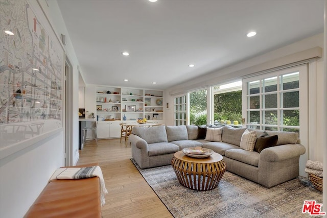 living room featuring light wood-type flooring