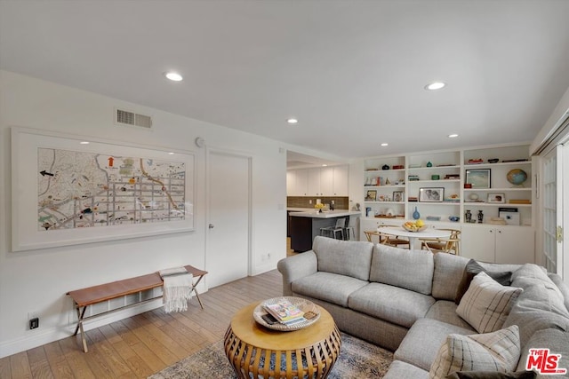 living room featuring light hardwood / wood-style flooring