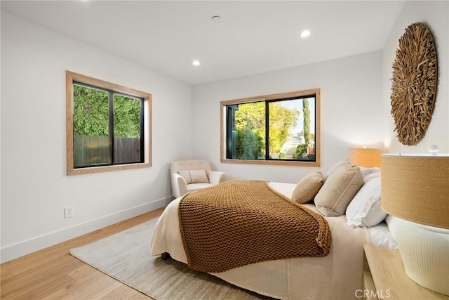 bedroom featuring hardwood / wood-style flooring