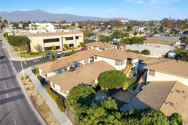 drone / aerial view featuring a mountain view