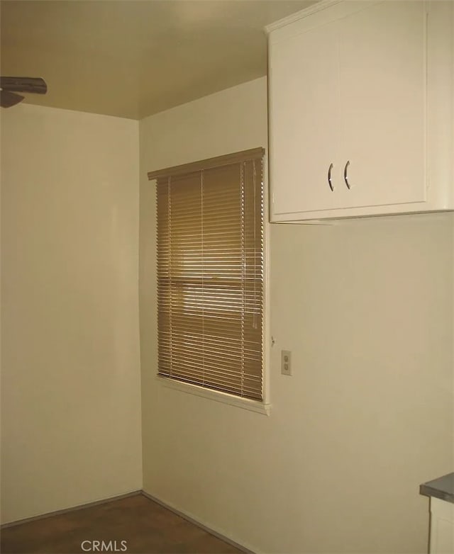 spare room with ceiling fan