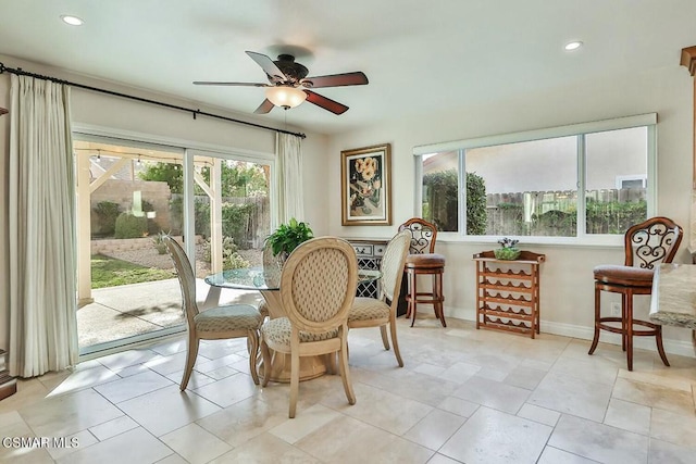 sitting room with ceiling fan