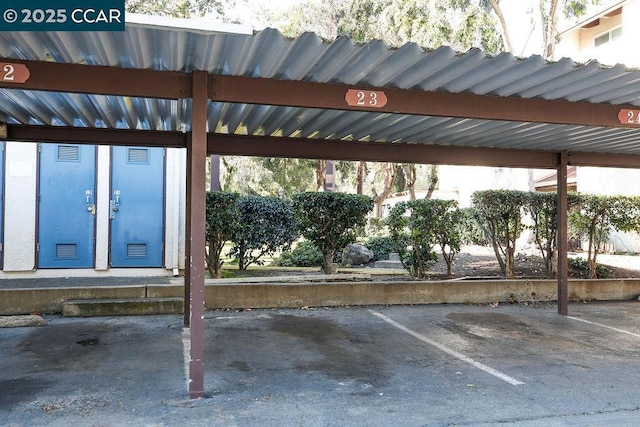 view of parking with a carport