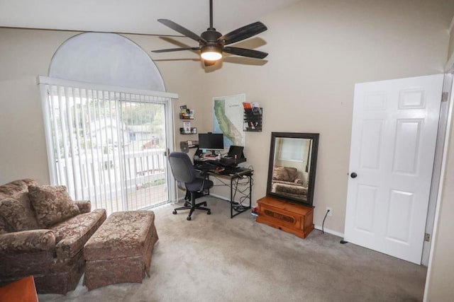 home office with ceiling fan and carpet