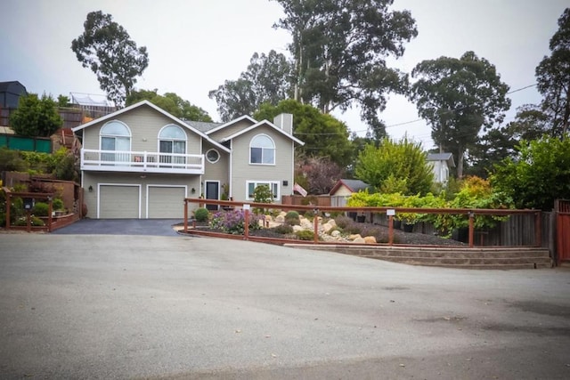 front facade with a garage