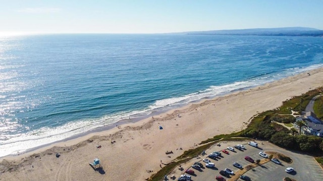 property view of water featuring a beach view