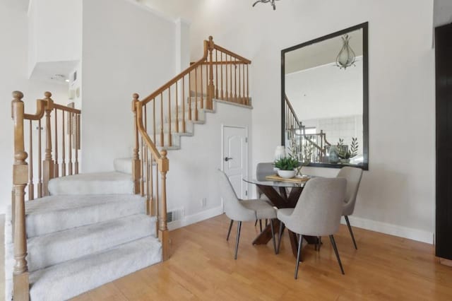 dining space featuring light hardwood / wood-style floors