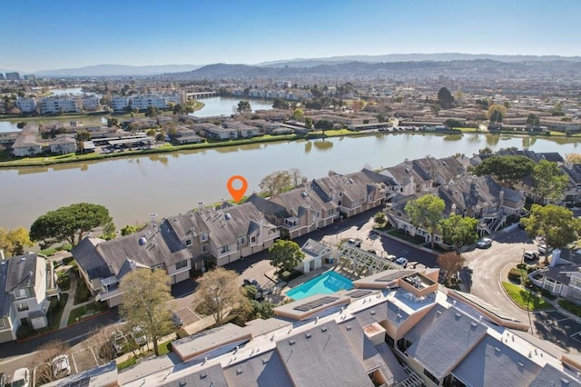 bird's eye view featuring a water and mountain view