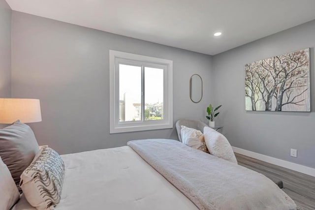 bedroom featuring wood-type flooring