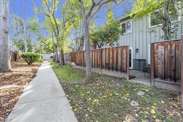 view of yard with central AC