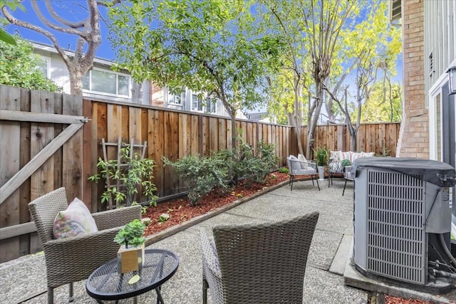 view of patio with central air condition unit