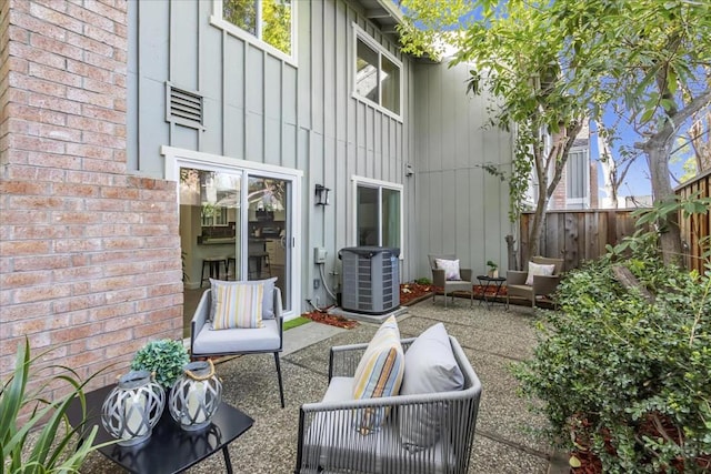 view of patio featuring central AC unit and an outdoor living space