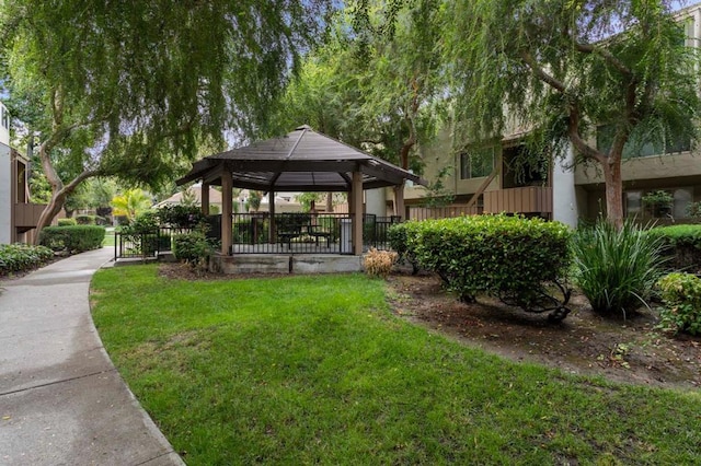 view of home's community featuring a gazebo and a yard