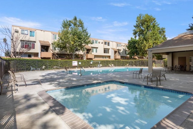 view of pool featuring a patio