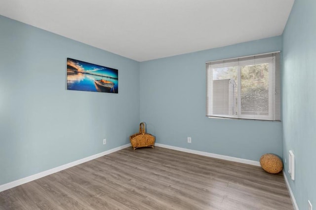 empty room featuring light hardwood / wood-style floors