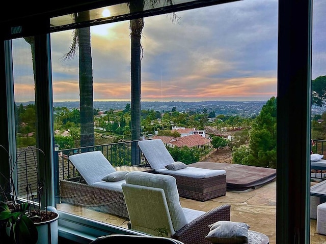 patio terrace at dusk with a balcony