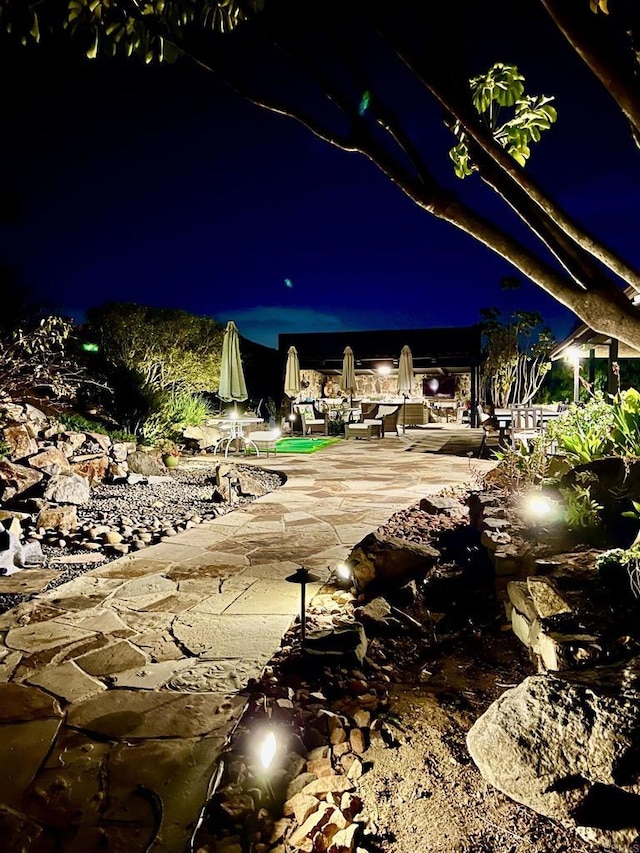 view of patio at twilight