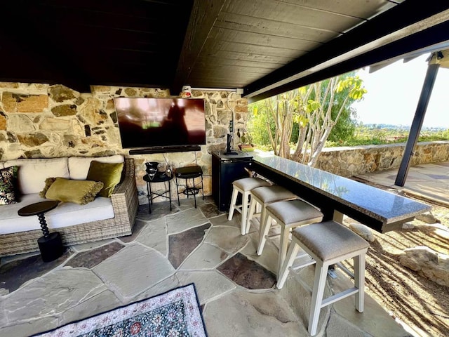 view of patio featuring outdoor dry bar
