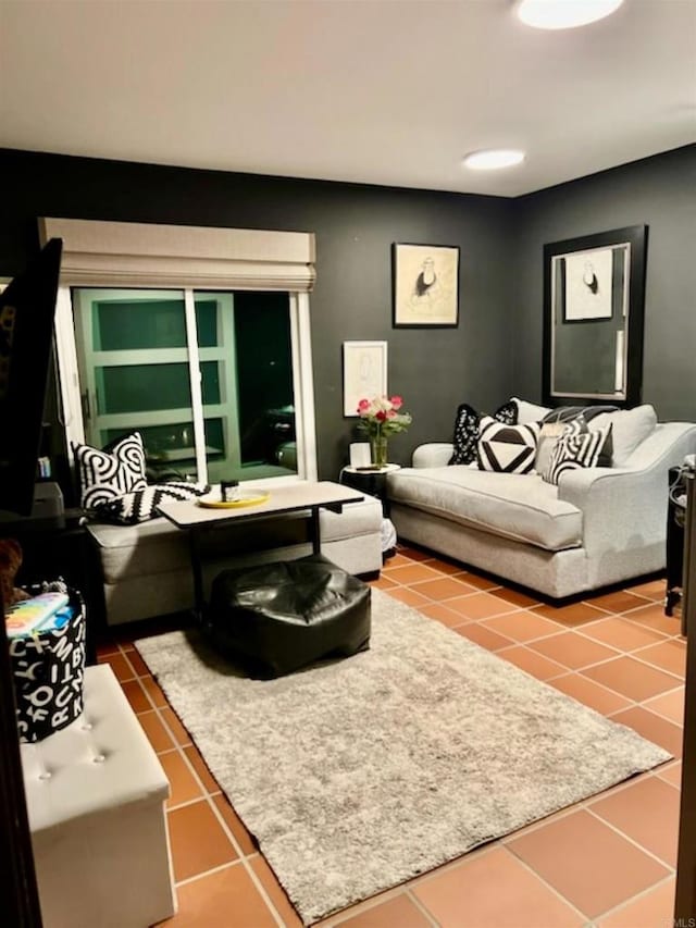 living area with tile patterned flooring