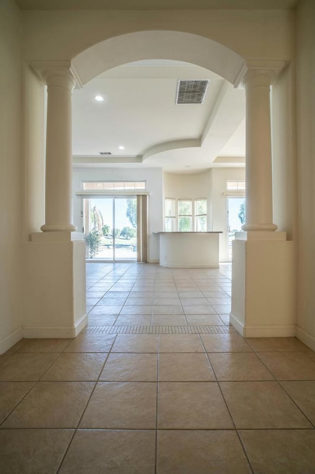 empty room featuring light tile patterned floors