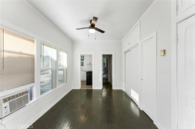 interior space with ceiling fan