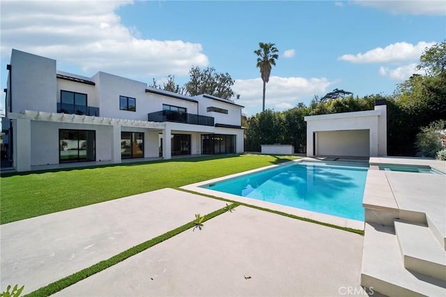 outdoor pool with a yard