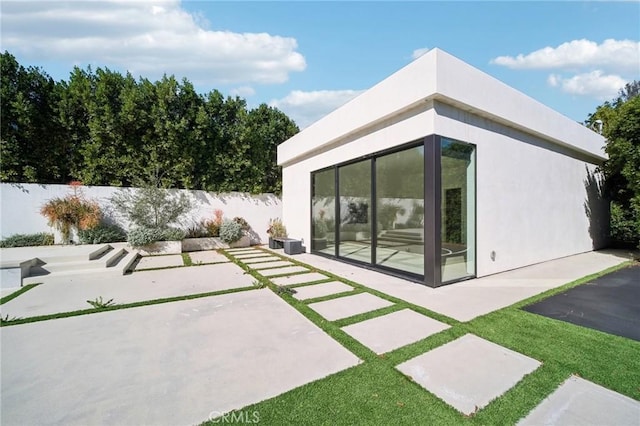 view of patio / terrace with fence